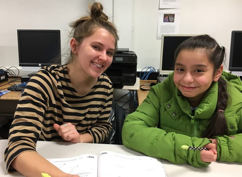 two students sitting at a table